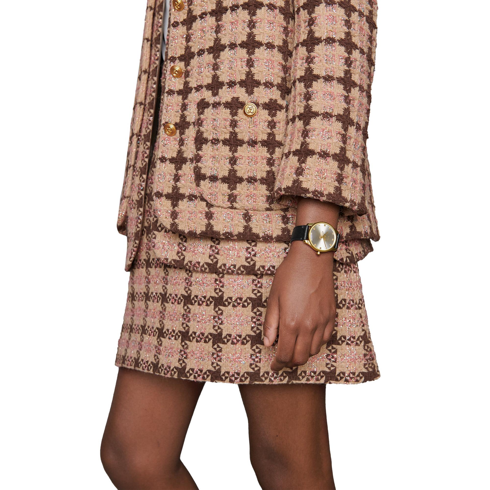 Elegant Gucci G-Timeless Ladies' Gold Tone Black Leather Watch